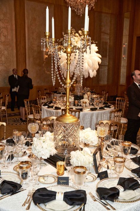 wedding-reception-vintage-deco-inspired-crystals-gold-candelabra-centerpiece-tall-arrangement Wedding Elegant Centerpieces, Gatsby Birthday Party, Gatsby Party Decorations, Hollywood Glam Wedding, 20s Wedding, Gatsby Wedding Theme, Candelabra Centerpiece, Old Hollywood Wedding, Gatsby Theme