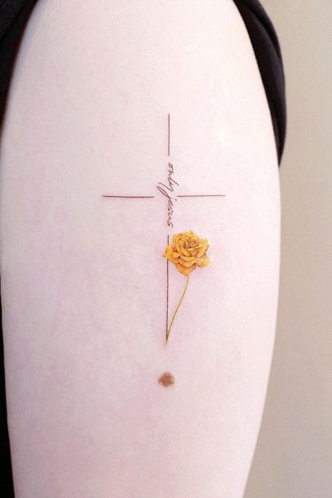 Cross With Marigolds Tattoo, Christhamum Tattoo, Cross Daisy Tattoo, Fine Line Religious Tattoo, Cross With Sunflower Tattoo, Cross Floral Tattoo, Female Cross Tattoos, Minimal Cross Tattoo, Sunflower Cross Tattoo