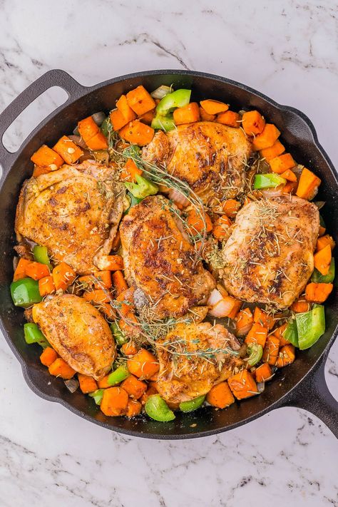 Chicken and Sweet Potato Skillet - 🍗🍁🍠 An EASY one-skillet chicken dinner recipe complete with sweet potatoes, bell peppers, and onions for impressive texture and flavor! It's all seasoned with smoked paprika, oregano, rosemary, thyme, and there's a simple sauce with maple syrup and Dijon mustard that lends all the cozy fall vibes! This is COMFORT FOOD that's great for busy weeknights and chillier weather. 's all seasoned with smoked paprika, oregano, rosemary, thyme, and there's a simple sau Chicken Breast And Sweet Potato Recipe, Southwest Sweet Potato Skillet, Honey Roasted Chicken And Sweet Potatoes, Chicken Sweet Potato Asparagus, Asparagus Sweet Potato Chicken Skillet, Chicken And Sweet Potato, Potato Skillet, Chicken Dinner Recipe, Sweet Potato Dishes