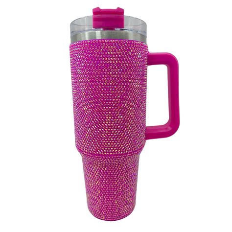 PRICES MAY VARY. Food grade stainless steel, vacuum insulated. Double walled, sweat proof. Powder coated finish. Fits in most cup holders. BPA free. Very Sparkly Durable Splash proof This rhinestone tumbler is a must-have for any party, and it's sure to impress your guests. This 40 oz tumbler is made of high-quality stainless steel, and it comes with a clear lid and straw. The double wall vacuum insulation keeps your drinks hot or cold for hours, and the rhinestones add a touch of luxury. The tu Rhinestone Tumbler, 40 Oz Tumbler, Insulated Cups, Sweat Proof, Cup Holders, Tumblers With Lids, Insulated Tumblers, Cup Holder, Powder Coated