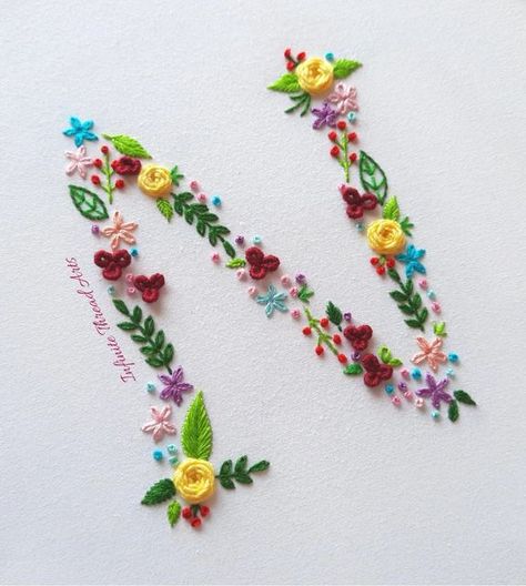 ‎Tehseen Embroidery Works 🌻 صنوبر تحسين‎ on Instagram: "Flower letter "N" embroidery🌹Watch full video tutorial on my YouTube channel 'Infinite Thread Arts'. Link in bio. Dm to order customized floral letters 😍 #handmadeembroidery #handembroidery #handmade #embroiderydesign #embroiderypattern #embroidersofinstagram #embroideryhoopart #embroiderywork #embroidery #embroideryart #embroiderylove #embroideryflowers #letters #embroideries #stitchersofinstagram #needlework #nakış #ricamoamano #ricam Letter N Embroidery, Embroidery Watch, Basic Hand Embroidery Stitches, Flower Letter, Embroidery Letters, Embroidery Works, Thread Art, Flower Letters, Letter N