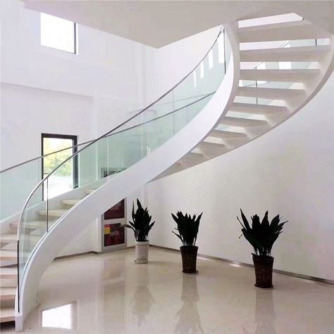 Glass Railing Curved Staircase with wooden tread It install indoor . 6+6mm box curved staircase stringer,irregular wooden tread, glass railing with top C-cap . Customized dimension Curved Stairs Design Modern, Curvy Stairs, Floating Curved Staircase, Curved Floating Stairs, Glass Curved Staircase, Sculptural Staircase, Curved Staircase Glass Railing, Staircase Glass, Staircase Manufacturers