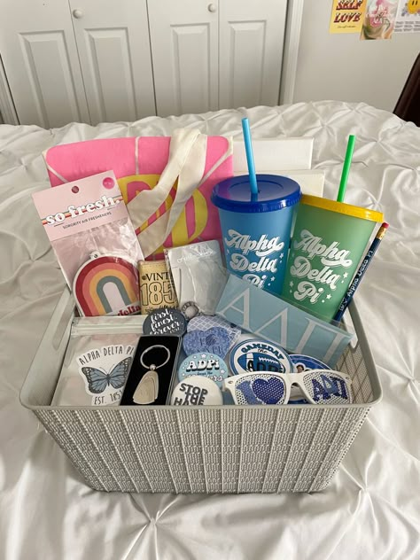 big little basket ideas adpi gifts sorority canvas Sorority Goodie Bags Gift Ideas, College Bday Gifts, Bid Day Baskets Gift Ideas, Big And Lil Gift Ideas, Sorority New Member Gifts Bid Day, Big/ Little Gifts, Big Sis Little Sis Gifts Sports, Basket Ideas Sorority, Cute Big Little Gifts