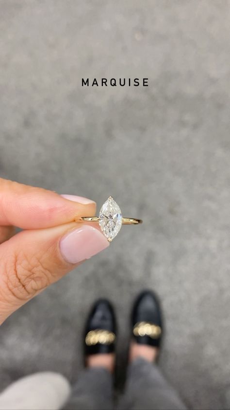 harmonyjewelslondon on Instagram: How gorgeous is this marquise cut engagement ring 💍 Comment if you ❤️ Tag your partner 📲 #marquisecut #marquisecutdiamond #couplegoals… Minimalist Marquise Engagement Ring, Brilliant Earth Engagement Rings Marquise, 2 Carat Marquise Engagement Ring Gold, Round Marquise Engagement Ring, Marque Engagement Ring, Pointed Oval Engagement Ring, Gold Band Marquise Diamond Ring, Different Wedding Rings Unique, Marquise Gold Ring