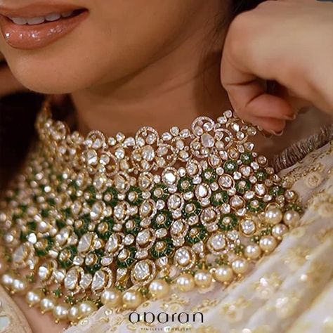 The bridal beauty of a woman is closest to her heart and we make sure to craft magnificent jewels for your perfect day... Handcrafted with finesse, the regal 18K Gold Choker is augmented with uncut diamonds, emeralds & pearls for your D-Day 💎 #BridalCollection #AbaranTimelessJewellery // #bridaljewellery #bridalcollections #bridestobe #bridaljewelleryset #polkijewellery #jadaujewellery #jewellerydesign #rubyjewellery #gemstonejewelry #instajewellery #jewellery #jewellerydesign #pearls #jewell Enamel Jewellery, Magnificent Jewels, American Diamond Jewellery, Gold Jewelry Simple Necklace, Pearl Necklace Designs, Antique Bridal Jewelry, Bridal Diamond Jewellery, Polki Jewellery, Jewellery Inspiration