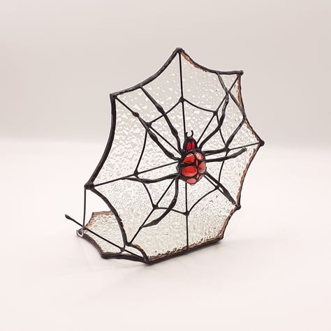 Candles are not included.The spider is a fantastic present for you and the nearest. It will bring you development, love of life and faith in luck. All your dreams will come true.Put it on the table or a window at home, in the garden.Enjoy the handmade unique piece of beauty.We used traditional stained glass Tiffany technique to make this candle holder.Every piece is truly one of a kind.USAGE:You can use this ornament as: candle holder tabletop ornamentDIMENSIONS: height is 5.5" (14cm) width is 5 Stained Glass Halloween Patterns, Stained Glass Spider Web, Stained Glass Spider, Glass Spider, Stained Glass Candle Holders, Stained Glass Candles, Love Of Life, Home Decor Halloween, Mosaic Stained