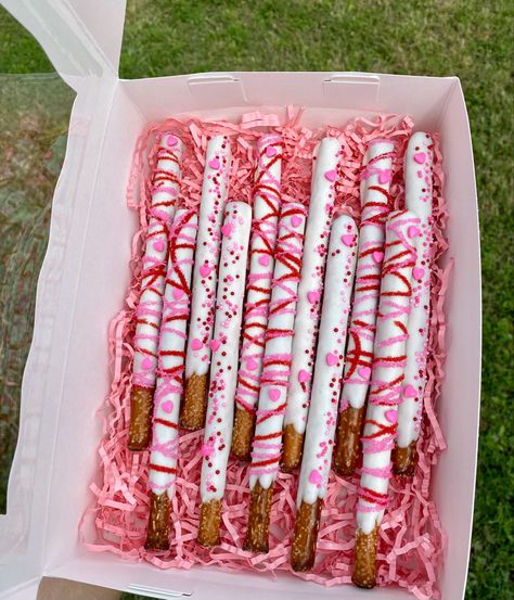 #white #pink #red #valentinesday #chocolate #pretzels Chocolate Covered Pretzels Valentines, Pink Pretzels Sticks, Chocolate Covered Pretzels Valentines Day, Valentine Pretzels, Bf Valentines Gift, Pink And White Pretzel Rods, Gourmet Pretzels, Pretzel Sticks Dipped In Chocolate Pink, Berry Ideas