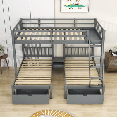 Sleep in a space-saving style with the functional design of the bunk bed. The increased sleeping capacity is the perfect solution for cottages, extended family, out-of-town guests, or hosting your child's rambunctious friends for a sleepover. The triple bunk bed offers a space-saving design with two twin-size beds and a full-size bed, configured to fit in the corner of the room. Featuring clean lines, horizontal slats, and built-in stepladders to access the top bunks, the unique bunk bed design Full Over Full Bunk Beds Small Room, Full Over Twin And Twin Bunk Bed, 3 Bed One Room, Triple Bunks, Bunk Beds For Small Room, 3 Bunk Beds Small Spaces, Amazing Bunk Beds, 3 Twin Beds In One Room, Double Bunk Beds Small Room