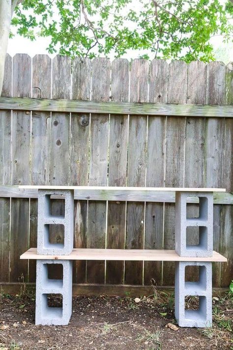 27 Brilliant Ways to Use Cinder Blocks in Your Yard Cinder Block Shelves Outdoor, Cinder Block Potting Bench, Cinder Block Diy, Cinder Block Shelves, Diy Display Shelf, Cinder Blocks Diy, Cinder Block Fire Pit, Cinder Block Bench, Outdoor Shelves