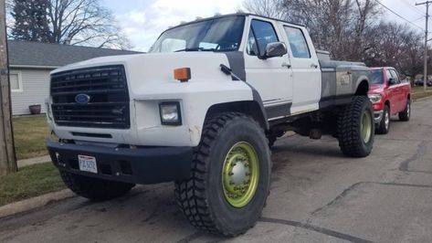 This 1991 Ford F-700 Pickup Conversion Makes Other Trucks Look Tiny 1995 Ford F150 Lifted, Ford Work Trucks, 1996 Ford F250 Diesel, 1986 Ford F250 4x4, 1997 Ford F350 Dually Flatbed, Truck Life, Big Ford Trucks, 4x4 Truck, 1997 Ford F250 7.3