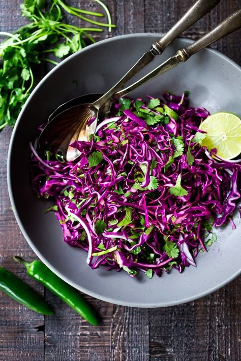 Mexican Slaw with Cilantro and Lime https://www.feastingathome.com/mexican-slaw/ Mexican Slaw, Plant Paradox Recipes, Mexican Feast, Mango Slaw, Feasting At Home, Light Dinner Recipes, Mexican Salads, Mexican Night, Salads Bowls