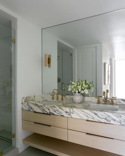 Anne Avery Interiors on Instagram: "Minimal and sleek master vanity 📸 @amybartlam #customcabinets #customcabinetry #marbledesign #bathroom #japandi #modernbathroom #customcountertops" Marble Shower Wood Vanity, Japandi Vanity, Hollywood Bungalow, Reno Bathroom, Master Vanity, Bathroom Japandi, Washington House, Washington Houses, Japandi Home