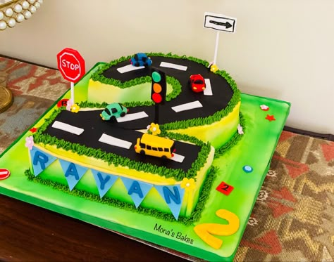 Number 2 cake with edible signs and cars, airbrush tecnic Number 2 Car Cake, Vehicle Cake 2nd Birthday, Cars And Trucks Birthday Cake, Number 2 Cake Boy, Vehicle Cakes For Boys, 2 Cake Number, Number 2 Cake Design, Transportation Cakes For Boys, Vehicle Birthday Cake