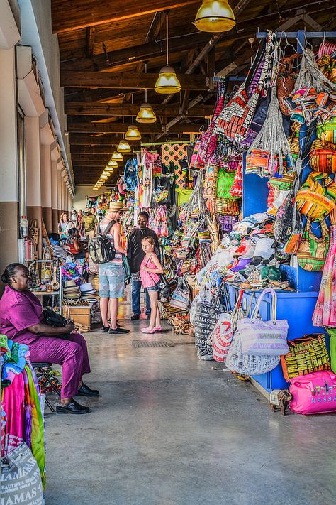 Nassau Straw Market  The Straw Market has been cleaned up quite a bit since the last time I saw it.  It is still a mass jumble of all things tourist - beads, straw hats, t-shirts and such.  But, the hawkers do not accost you quite so much and the place is better kept now. Nassau Straw Market, Bahamas Honeymoon, Atlantis Bahamas, Island Crafts, Bahamas Travel, Bahamas Vacation, Bahamas Island, Cruise Planning, Bahama Mama