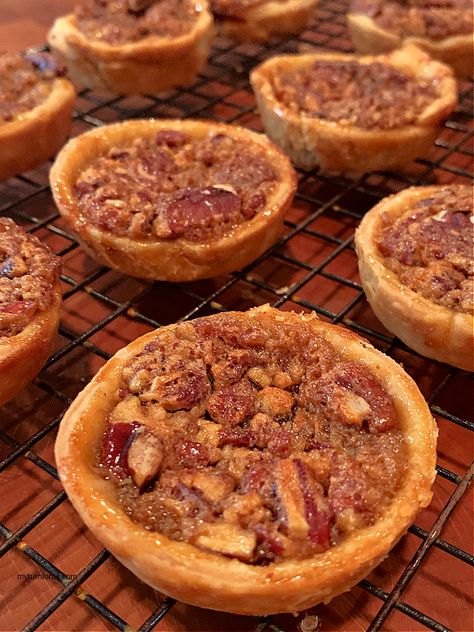 Mini Southern Pecan Pies Individual Pecan Pies Recipe, Mini Derby Pie Recipe, Keto Mini Pecan Pies, Pecan Pie In Muffin Tin, Mini Peach Pies Muffin Tins, Cupcake Pan Pies, Pecan Pie Bites Pioneer Woman, Pecan Pie Mini Pies, Pecan Pie Tarts Mini