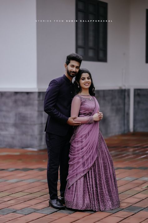 Bride & Groom
Kerala Engagement dress Lavender Bride And Groom Indian, Lavender Reception Dress, Purple Couple Outfits Indian, Engagement Outfits For Bride And Groom, Engagement Christian Dress, Christian Wedding Couple Dress, Lavender Couple Outfits, Bride Reception Dresses Indian, Engagement Couple Dresses