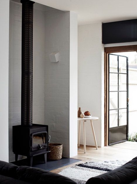 Whiting Architects adds utilitarian extension to Melbourne residence Masculine House, Melbourne House, 아파트 인테리어, Wood Burner, Australian Homes, Scandinavian Home, Wood Burning Stove, Wood Stove, Barn House