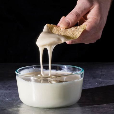 Ultrabeefy Nacho Cheese Sauce - Cook's Illustrated | Cook's Illustrated Best Cheese Dip, Cooks Illustrated Recipes, American Test Kitchen, Cheesy Nachos, Donut Toppings, Caramel Chocolate Bar, Illustrated Recipe, Cheddar Cheese Sauce, Cookie Toppings