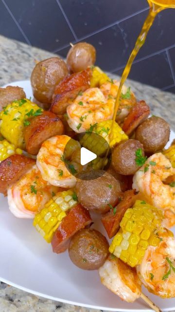 Bri’s Heat 💕 | Food Content Creator on Instagram: "I’ve been wanting to try these seafood boil kabobs and they were everything I thought they would be🤤  What y’all think?  Full recipe on my YouTube channel, click the link on my page to get there.  • • • • • • • • • • • #seafoodboil #shrimpboil #shrimp #corn #kabob #easyrecipes #quickrecipes #dinner #grilling #garlicbutter #cajun #shrimprecipes #shrimpkabobs #explore #explorepage✨ #stlfoodscene #stlfoodie #chicagofood #tasty #tastyfood #foodreels #foodie #foodblogger" Sausage And Shrimp Kabobs, Wedding Kabobs, Seafood Kabobs On The Grill, Shish Kabobs Shrimp, Shrimp Kabobs On The Grill, Seafood Kabobs, Sausage Kabobs, Shrimp Corn, Food Content Creator