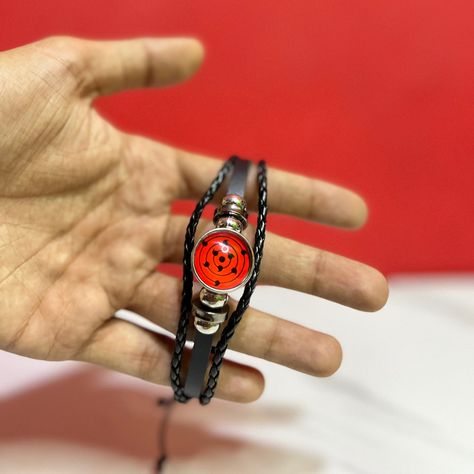 Naruto Mangekyo Sharingan Premium Bracelet Do you love anime cosplay items that give you a dashing look? Well, Naruto Wrist Bracelet can be a good fit for your taste. Being an anime fan, you would surely have watched Naruto! Cosplaying anime has always been a fun part of being an anime fan. Also, when we visit anime cosplaying events, it feels so special to be present there, among others cosplaying different anime characters! However, what about something that you can wear every day? Someth... Naruto Bracelet, Naruto Jewelry, Cosplay Items, Wrist Bracelet, Anime Cosplay, An Anime, Cosplay Anime, Naruto, Fan