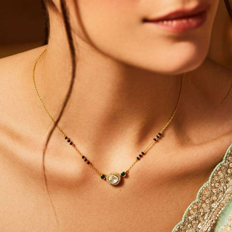 Unleash your style with our exquisite jewelry collection! 💎✨ Click the link to explore a variety of stunning pieces that will transform any outfit. From elegant necklaces to eye-catching earrings, find the perfect accessory to express your unique personality. Don’t wait—discover your new favorite jewelry today! 😄😇🤩 Single Diamond Mangalsutra, Contemporary Mangalsutra Designs, Wedding Mangalsutra Designs, Cute Mangalsutra Designs, Polki Mangalsutra Designs, Mangalsutra Designs Unique, Delicate Mangalsutra Designs, Polki Mangalsutra, Mangalsutra Ideas