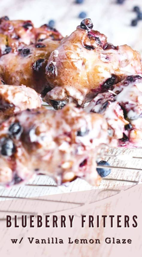 Perfect for breakfast, brunch, or even dessert, these quick and easy blueberry fritters are deep-fried then dipped in a sweet and citrusy vanilla lemon glaze. Naturally vegetarian. #blueberryfritters #berryfritters #donutfritters #blueberrydonuts #fruitfritters Easy Fritters Recipe, Blueberry Fritter, Crazy Easy Recipes, Blueberry Fritter Bites, Blueberry Fritters, Blueberry Donut Recipe, Blueberry Fritters Recipe, Rhubarb Oatmeal, Bagel Recipe Easy