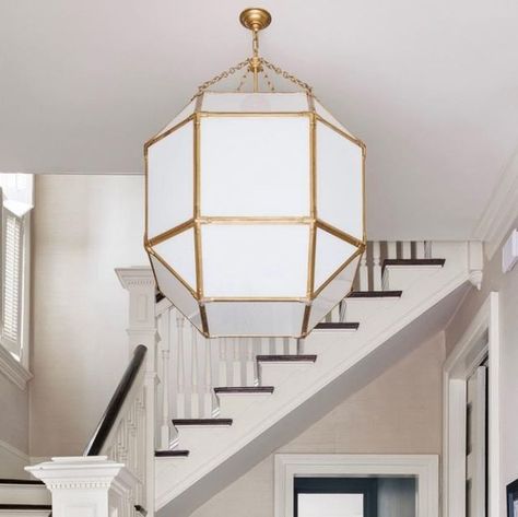 Visual Comfort & Co. on Instagram: "In a traditional entryway designed by New Orleans-based @whitneywilkinson_designstudio, our French-inspired Morris Large Lantern by Suzanne Kasler adds an extra layer of charm. The fixture's white glass panes are chic yet functional—allowing for diffused illumination. Build: @entablaturenola 📷: @lsteffan" Morris Lantern, Traditional Entryway, Large Lantern, Suzanne Kasler, Glass Panes, Large Lanterns, Texas House, Entry Way Design, Texas Homes