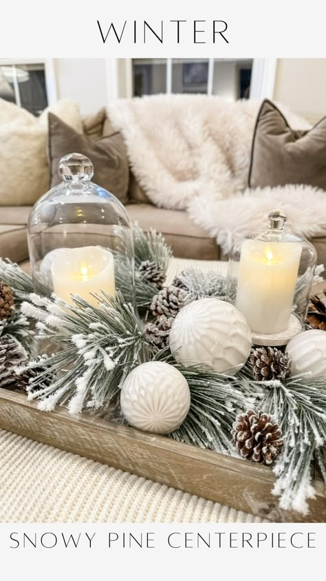 Janine Graff | Snowy Pine Centerpiece ❄️captures the essence of the winter season. I adore the soft glow of candlelight. It’s a challenge to maintain that... | Instagram January Dining Table Centerpieces, Winter Decor Centerpiece, Snowy Centerpiece Ideas, Simple Winter Table Centerpieces, Baby It’s Cold Outside Baby Shower Theme Centerpiece, Snow Centerpieces, Winter Tablescape Ideas, Winter Candle Centerpieces, Snowman Centerpiece Ideas