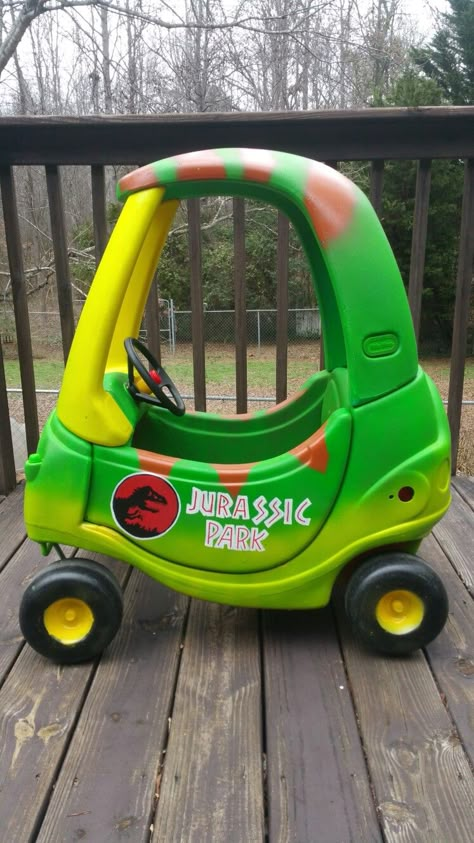 Jurassic Park cozy coupe makeover Lil Tykes Makeover, Jurassic Park Cozy Coupe, Fisher Price Car Makeover, Painted Cozy Coupe, Cozy Coupe Makeover Boys, Jurassic Park Room, Boy Nursery Dinosaur, Jurassic Park Car, Baby Boy Nursery Dinosaur