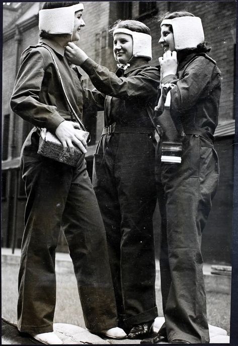 Nurses in Manchester wearing siren suits and concussion pads | VE Day: Forties-inspired fashions to celebrate the 75th anniversary in style | The Independent 40s Suits Women, 1940s Womens Suits, Siren Suit 1940s, 1940s Sailor Pants, 40s Suit, Europe Day, Make Do And Mend, Trafalgar Square, London Pubs