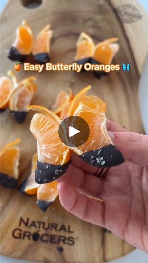 Easy Butterfly Oranges | This simple and fun butterfly sweet treat will have you saying, “orange you the cutest”. 🍊🦋 | By Natural Grocers Butterfly Appetizers, Butterfly Fruit Tray, Butterfly Charcuterie Board, Orange Butterfly Party Theme, Charcuterie Board Butterfly, Butterfly Food Ideas, Butterfly Food Art, Butterfly Orange Slices, Orange Monarch Butterfly Party