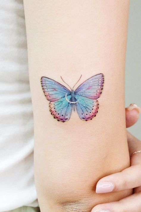 Beautiful Butterfly Tattoo Ideas to Decorate Your Body ★ Colour Butterfly Tattoo, Rainbow Butterfly Tattoo, Shoulder Butterfly Tattoo, Daschund Tattoo, Colour Butterfly, Butterfly Tattoo Ideas, Butterfly Tattoo Meaning, Piercing Chart, Rainbow Tattoos