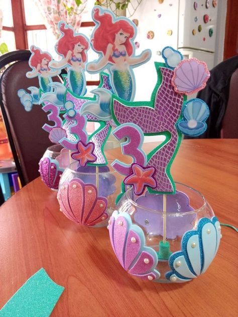 Diy Mermaid Birthday Shirt, Ariel Bday Party Ideas, Baby Ariel Birthday Party, Mermaid Centerpiece Ideas Diy, Mermaid Party Table Decor, Ariel Centerpieces Ideas, Little Mermaid Balloon Garland, Ariel Birthday Party Decorations, Mermaid Centerpiece Ideas