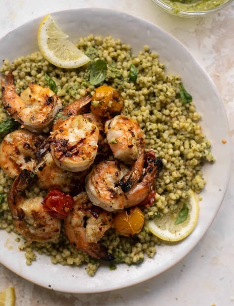 grilled lemon shrimp with pesto couscous Shrimp With Pesto, Pesto Couscous, Couscous Bowls, Shrimp Couscous, Pistachio Granola, Cilantro Lime Salmon, Couscous Recipe, Pesto Shrimp, Grilled Lemon