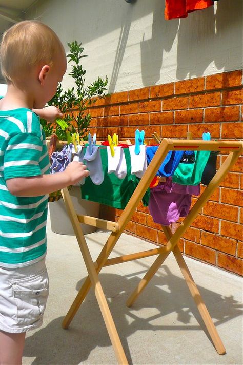 Montessori Laundry, Watering The Garden, Montessori Parenting, Hanging Laundry, Dog Storage, Practical Life Activities, Montessori Playroom, Montessori Room, Baby Sensory Play