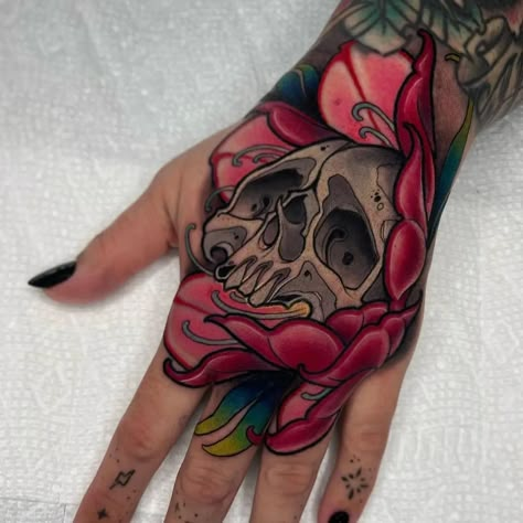 @travisbrown918 | Instagram Skull Flower Hand Tattoo, Neo Traditional Hand Tattoo, Neo Traditional Skull Tattoo, Hand Tattoos For Guys Ideas, Hand Flower Tattoo, Fist Tattoo, Traditional Hand Tattoo, Skull Tattoo Flowers, Eyeball Tattoo