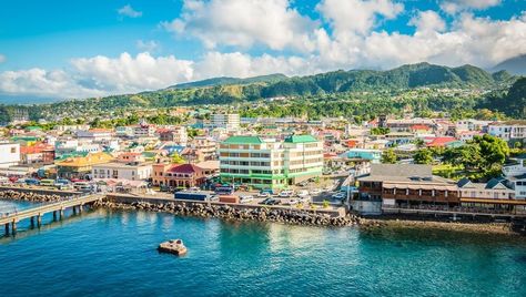 Did you know that some of the world’s most beautiful capitals are also tiny? These small cities are the best in the world. Make sure you don't miss them. Roseau Dominica, Best Honeymoon Destinations, Harbour Island, Best Honeymoon, Honeymoon Destinations, Caribbean Islands, Portsmouth, Beautiful Islands, Travel And Leisure