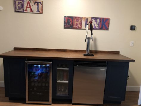 We used Ikea cabinets and a Lowe‘s butcher block. #diy #homebar #kegerator #gameroom Dry Bar With Kegerator, Kegerator Cabinet Diy, Built In Kegerator Home Bars, Kegerator Bar Ideas, Diy Kegerator, Butcher Block Diy, Diy Dry Bar, Kegerator Cabinet, Outdoor Kegerator