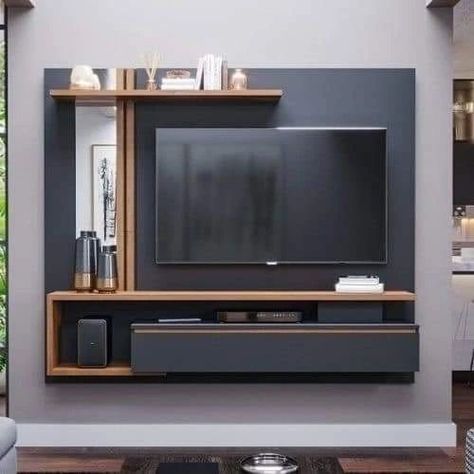 Tv Unit Design idea ✨️ #trendingpost #homedecor #interiordecorating #livingroomdesigns #interiors #reelitfeelit #tvunitdesigns #homedesignsdworld #interior #tvunit #livingroomdesign #wallpanels #interiordesign #fypシ゚viralシ2024fyp #dailylifehacks #easydiy #gardeningtips #housedecoration #dailywear Living Room Tv Cabinet Designs, Modern Tv Unit Designs, Wall Unit Designs, Tv Unit Furniture Design, Tv Unit Decor, Modern Tv Wall Units, Tv Stand Decor, Tv Unit Furniture, Tv Unit Interior Design