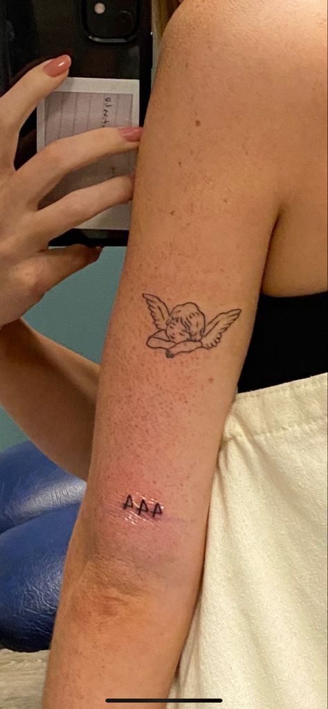 Cherub Tattoo Back Of Arm, Mini Cherub Tattoo, Sunday Tattoo Design, Cherub Tattoos For Women, Cherub Tattoo Back, Minimalist Cherub Tattoo, Cherub Outline Tattoo, Classy Womens Tattoos, Cherub Tattoo Fine Line