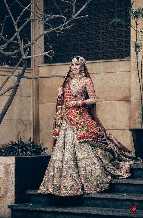 A bride in a stunning lehenga with double dupatta and vintage jewelry Double Dupatta Lehenga, Double Dupatta, भारतीय दुल्हन संबंधी, Rimple And Harpreet Narula, Sikh Bride, Wedding Lehenga Designs, Indian Bridal Lehenga, Bridal Poses, Bridal Outfit