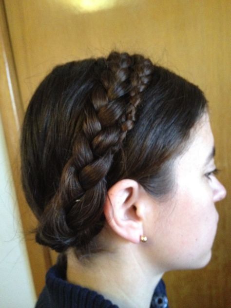 Part your hair in the middle, and braid each half of your hair so that you have two braided pigtails. Tie off your braids with the small elastics.      Position one braid up over the top of your head, so that the end of the braid is pointing toward the opposite ear. Pin into place.      Repeat with the other braid, arranging the braids and pins so that the braid ends are tucked away and hidden. Braid Over Head, Heidi Braids, Natural Long Hair, Braided Pigtails, Doing My Hair, Long Hair Care, Two Ponytails, Bun Pins, Ear Pin