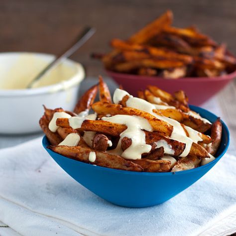 Baked Spicy Fries with Garlic Cheese Sauce. Garlic Cheese Sauce, Spicy Fries, Garlic Cream Cheese, Cream Cheese Sauce, Breakfast And Brunch, Garlic Cheese, Baked Fries, It Goes On, Cheese Sauce