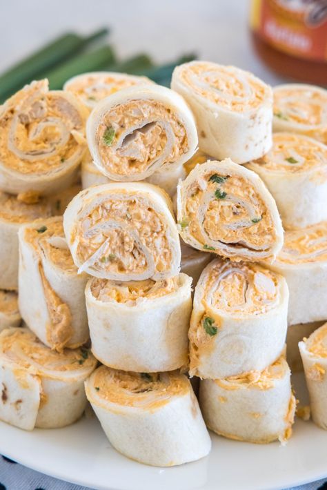 Buffalo chicken pinwheels are a quick and easy appetizer packed with bold Buffalo flavor. Roll up the spicy chicken filling, chill, and slice! Pinwheel Appetizer, Buffalo Chicken Pinwheels, Buffalo Chicken Rolls, Chicken Pinwheels, Tortilla Pinwheels, Buffalo Chicken Wraps, Chicken Roll Ups, Easy Buffalo Chicken, Tailgate Recipes