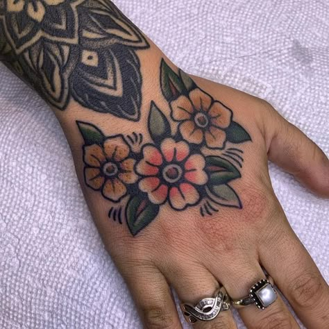 Elisia Lee on Instagram: "Couple recent smaller ones, thanks for getting tattooed 🤍 have some news coming up this week, stay tuned 🌞" Gap Filler Tattoos Women, Botanical Tattoo Traditional, Traditional Flag Tattoo, Traditional Finger Tattoos Women, Traditional Thumb Tattoo, Wrist Tattoos Traditional, American Traditional Wrist Tattoo, Scatter Tattoos, Floral Cuff Tattoo