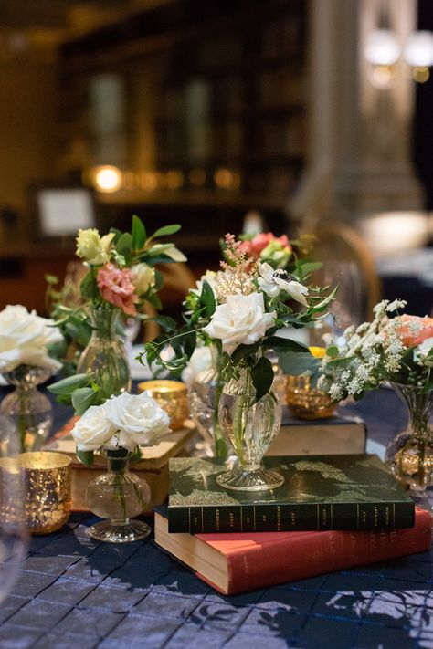 Books On Wedding Tables, Books And Flowers Centerpiece, Vintage Books Wedding Decor, Tablescape With Books, Book Wedding Aesthetic, Wedding Library Theme, Wedding Book Decor, Academic Wedding, Book Centerpiece Wedding