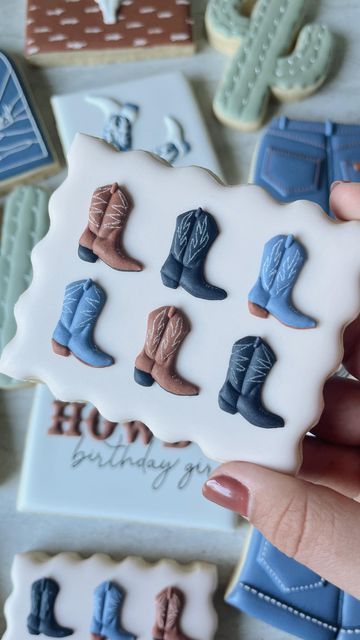 Cami Logan | Custom Decorated Sugar Cookies on Instagram: "I took a little break from this set to post some holiday cookies but I hadn’t posted my favorite cookie yet from this set so you all get some more of these western cookies:) • Cutter from @wildflourbakeryla • • • • #westerncookies #bootcookies #westernart #cowgirlboots #cowgirl #westernstyle #westernlifestyle #birthdaycookies #birthdaygirlcookies #birthdaygirl #westerndesign #cookieart #cookiedesign #sugarcookieart #sugarcookiesofinstagram #cookielove #fancycookies #coolcookies #edibleart #royalicingtransfers #royalicingart #camiscookieco" Coyote Cookies Decorated, Cowboy Boot Sugar Cookies, Western Themed Cookies, Cowboy Boot Cookies Decorated, Barn Cookies Decorated, Cowboy Cookies Decorated, Cowgirl Cookies Decorated, Cowboy Sugar Cookies, Nashville Cookies