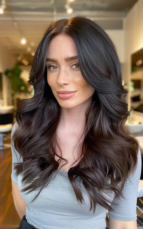 Long, thick dark hair styled in a voluminous blowout with soft curls and a center part Long Bombshell Haircut, Blow Outfit Hair Medium, Volume Blowout Long Hair, Hair Styles Blowout, Blow Outfit Hair Long, Long Hair Blowout Hairstyles, Brazilian Blowout Before And After, Long Bouncy Layers, Wedding Blowout Hair