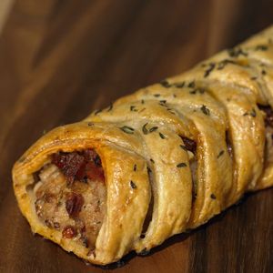 Try this delicious recipe for spicy sausage plaits - made with Jus-Rol's ready rolled puff pastry and topped off with sautéed onions and sundried tomatoes. Sausage Plait, Flaky Pastry Recipe, Easy Pastry Recipes, Hand Pies Savory, Sausage Dishes, Austrian Recipes, Pastry Recipe, Sundried Tomatoes, Croatian Recipes