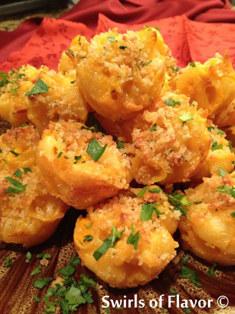 Our Mac and Cheese Bites recipe begins with a box of macaroni and cheese with creamy cheddar sauce. By adding just a few more ingredients and baking in mini muffin cups you’ll have a cheesy bite size appetizer that will be the hit of any get together, and oh so easy to make! #swirlsofflavor #macaroniandcheese #macandcheese #easy #recipe #appetizer #fromamix Macaroni And Cheese Appetizer Party Appetizers, Macaroni And Cheese Bites Appetizers, Homemade Mac And Cheese Bites, Mac Cheese Bites Appetizers, Bunko Food, Pepperoni Pinwheels, Mac N Cheese Bites, Cheddar Sauce, Cheese Bites Recipe